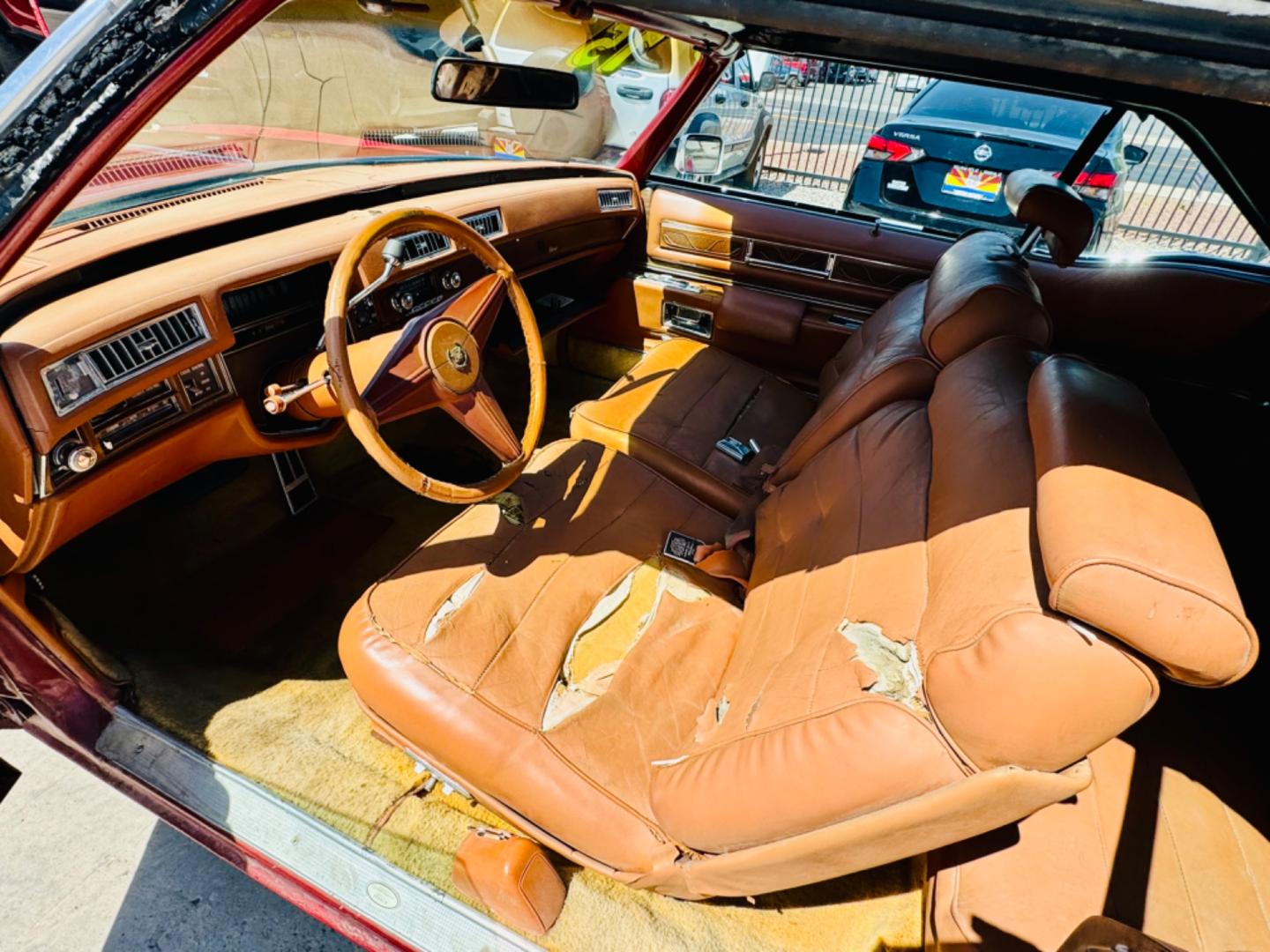 1975 Red Cadillac Eldorado convertible. , located at 2190 Hwy 95, Bullhead City, AZ, 86442, (928) 704-0060, 0.000000, 0.000000 - 1975 Cadillac Eldorado Convertible. Great project car for someone. New tires. Runs and drives, power top works. has a/c doesn't work. needs restoration. interior needs work, engine needs to be serviced . clear title. - Photo#16